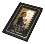 Memorabilia album with a portrait of a young boy praying and text 'Remembrance of My First Holy Communion' on a white background.