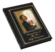 Black book with a portrait of a boy praying on the cover, titled 'Remembrance of My First Holy Communion'.