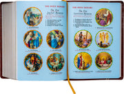 Open book showing illustrations and text about the Holy Rosary on a light blue background.