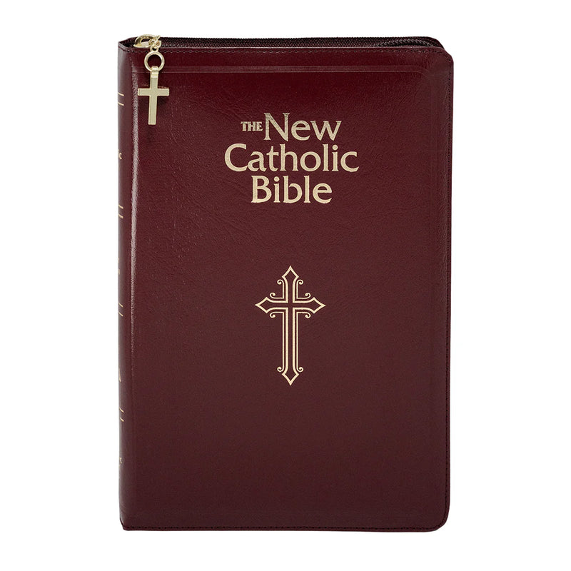Maroon leather-bound Bible with gold cross design on a white background