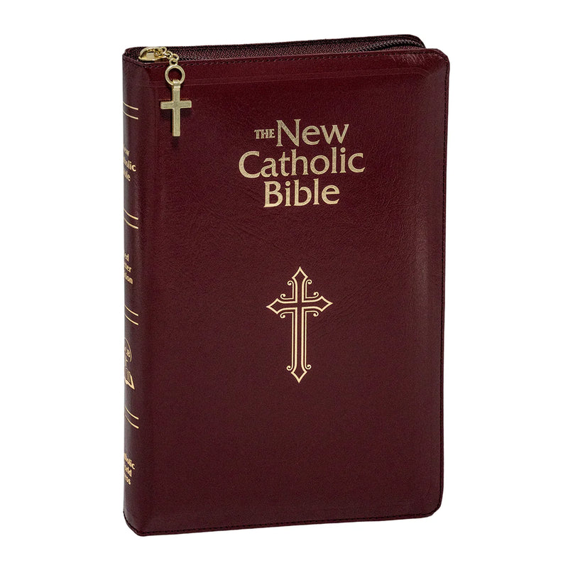 Maroon Bible with gold cross design on a white background