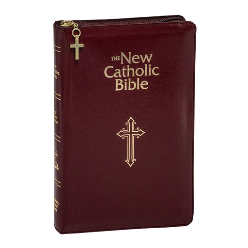 Maroon Bible with gold cross design on a white background