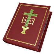 Red book with green and gold cross design on a white background