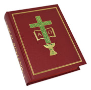 Red book with green cross and chalice design on a white background