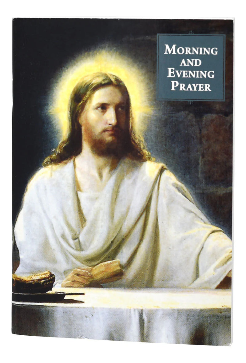 Book cover with a religious illustration of Jesus in a white robe, titled 'Morning and Evening Prayer'.