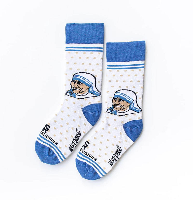 A person in white socks with blue accents and an image of Mother Teresa