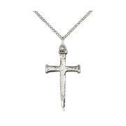 Silver cross pendant on a chain against a white background