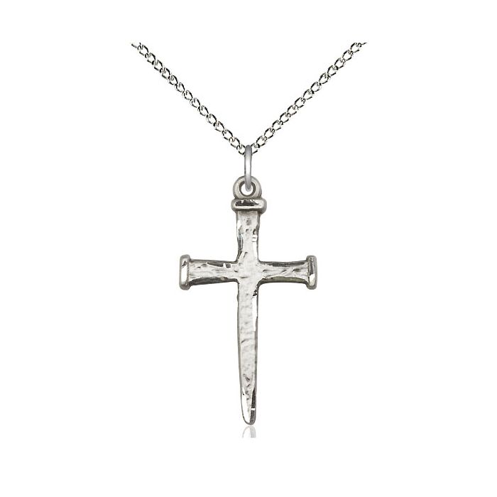 Silver cross pendant on a chain against a white background