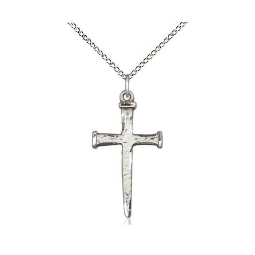 Silver cross pendant on a chain against a white background