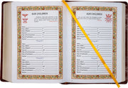 Open book with decorative pages and a yellow ribbon marker.