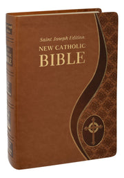 Brown leather-bound Bible with decorative design on a white background