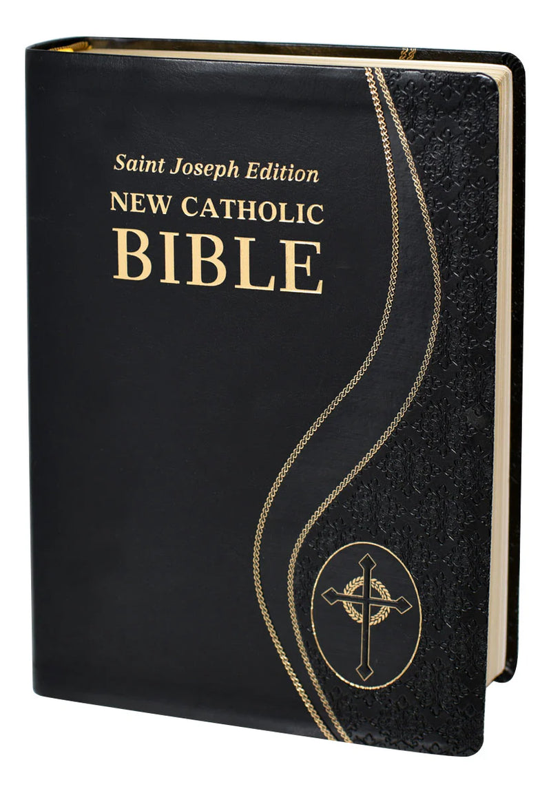 Black Bible with gold text and design on a white background