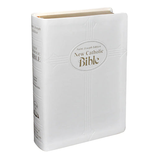 White New Catholic Bible with embossed text on a white background