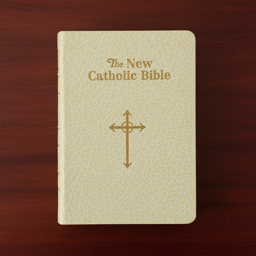 Beige Bible with 'The New Catholic Bible' text and cross symbol on a wooden surface