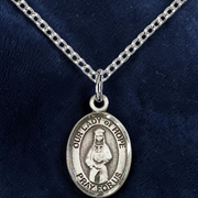 Silver pendant necklace with 'Our Lady of Hope' on a dark blue background