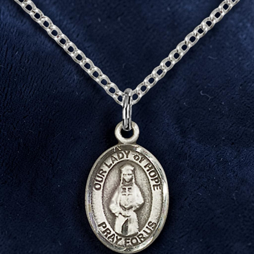 Silver pendant necklace with 'Our Lady of Hope' on a dark blue background