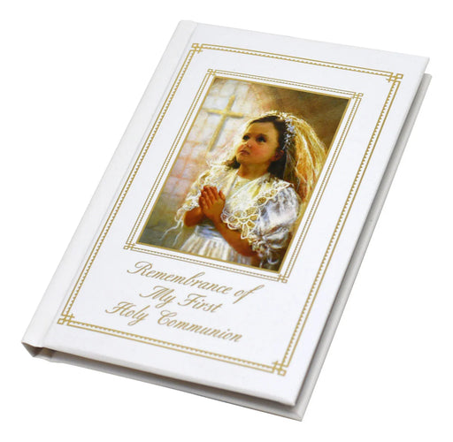 Booklet for First Holy Communion with a young girl in a white dress and veil on the cover.