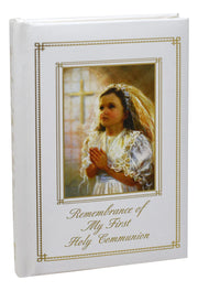 Book cover with a portrait of a young girl in a white dress and veil, with text 'Remembrance of My First Holy Communion'.