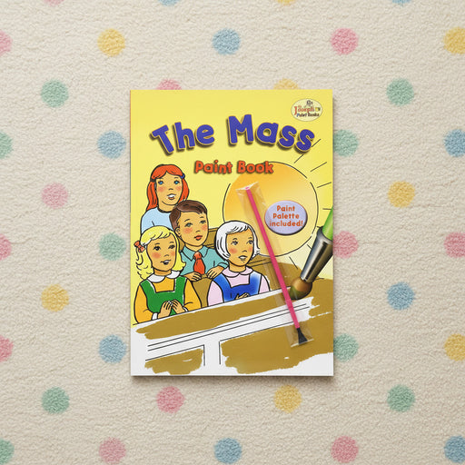 Book titled 'The Mass Paint Book' with colorful cover on a polka dot background