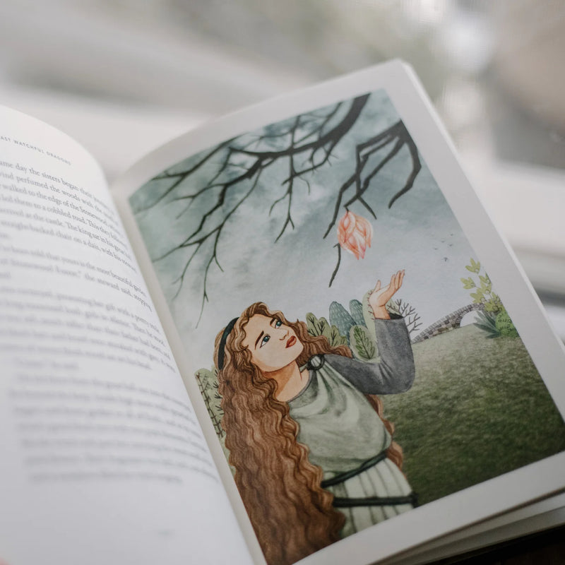 Open book with a illustration of a woman holding a flower in a garden