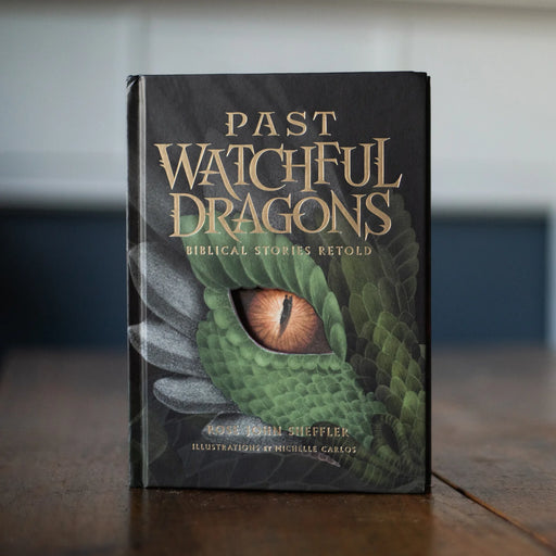 Book titled 'Past Watchful Dragons' with a dragon eye illustration on the cover.