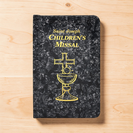 Saint Joseph Children's Missal on a wooden surface
