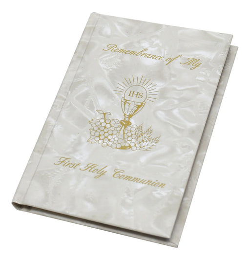 White book with gold text and design, likely for a religious ceremony, on a white background