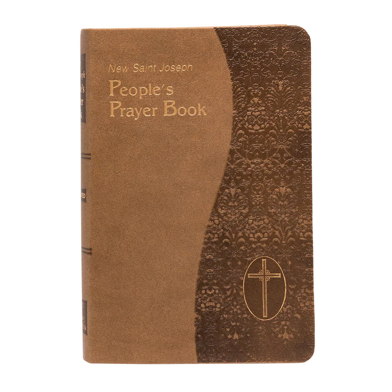 Brown prayer book with embossed design and cross emblem on a white background