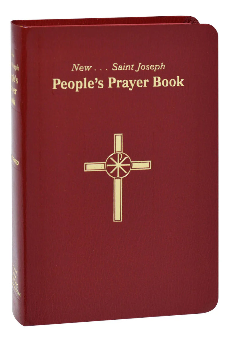 Red prayer book with gold text and cross design on a white background