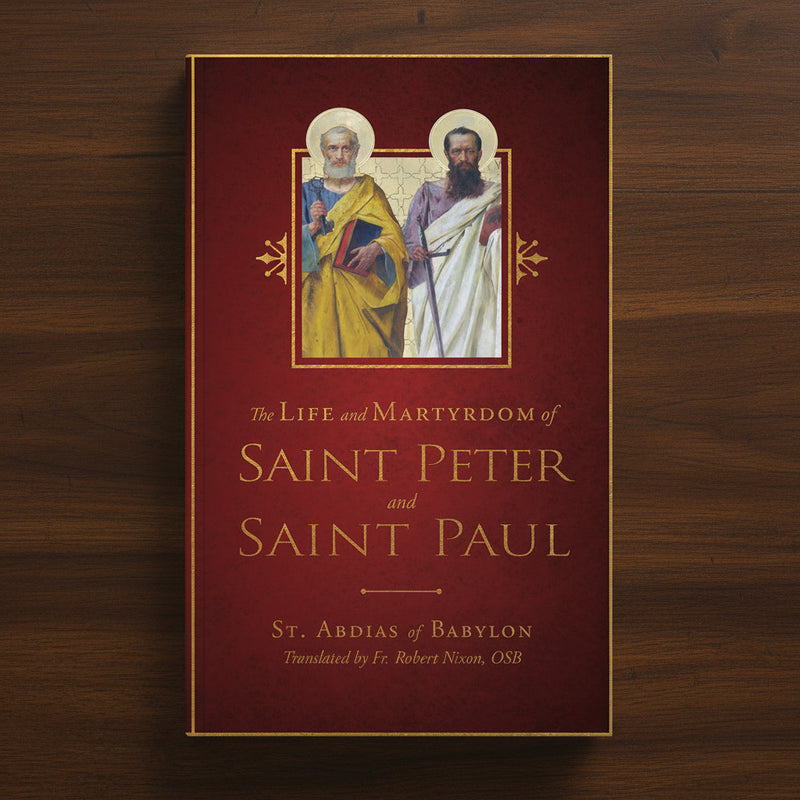 Book cover of 'The Life and Martyrdom of Saint Peter and Saint Paul' on a wooden background