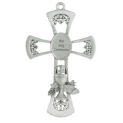 Metal First Communion gift cross with a chalice emblem.