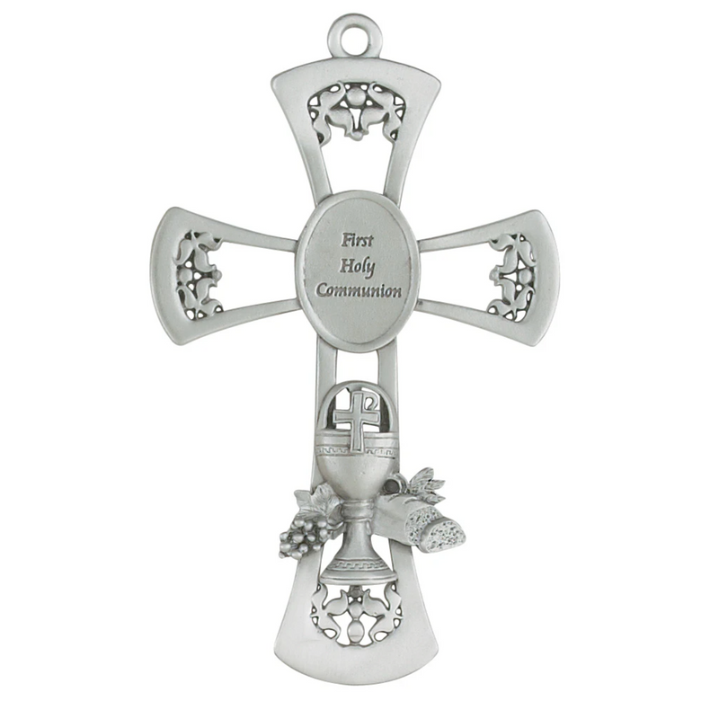 Metal First Communion gift cross with a chalice emblem.