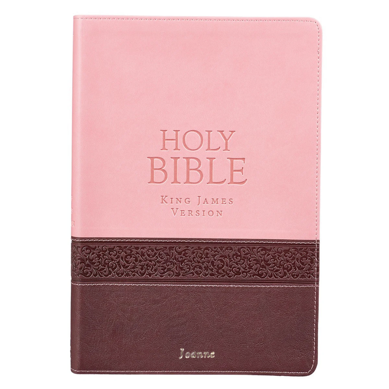 Pink and brown Bible with 'HOLY BIBLE King James Version' text on a white background