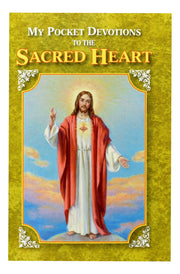 Yellow book with text 'My Pocket Devotions to the Sacred Heart' featuring an image of Jesus