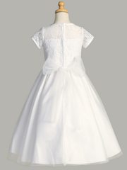 Rear view of a white lace First Communion dress with a sweetheart neckline on a gray background
