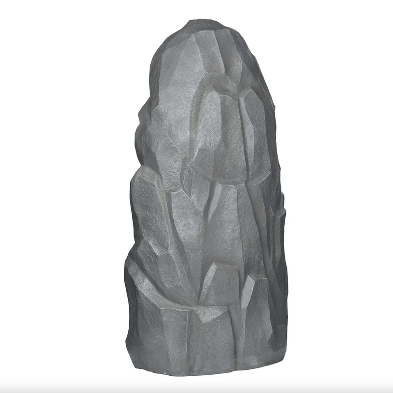 Rear view of a stone sculpture on a white background
