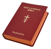 Red New Catholic Bible with cross symbol on a white background