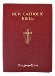 Red New Catholic Bible with cross symbol on a white background