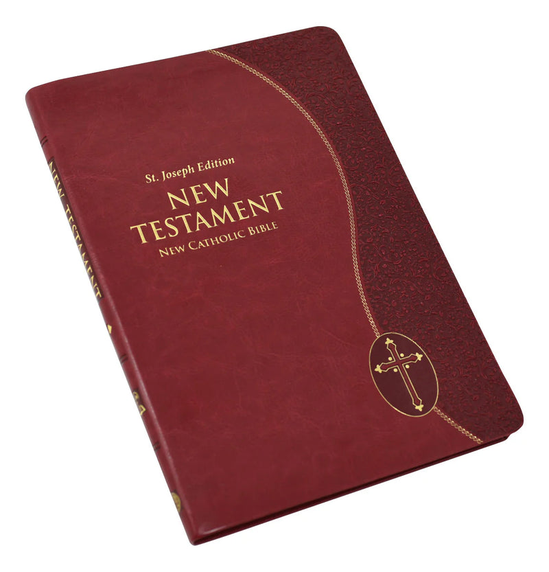Red leather-bound New Testament Bible with gold embossed text on a white background