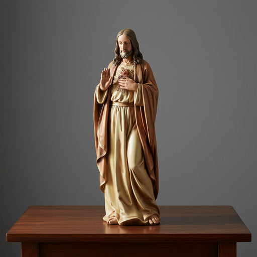 3 foot tall Sacred Heart of Jesus statue on a wooden table in natural lighting