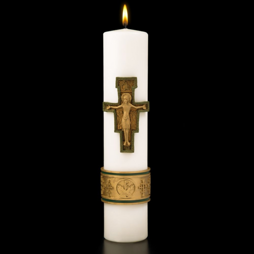 White candle with a decorative cross and emblem on a black background
