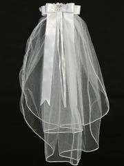 Full view of a satin ribbon, vintage style First Communion veil with a headband.