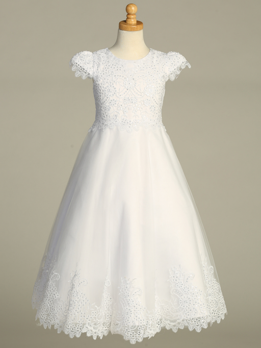 A a white lace First Communion dress with sequins over a gray background.