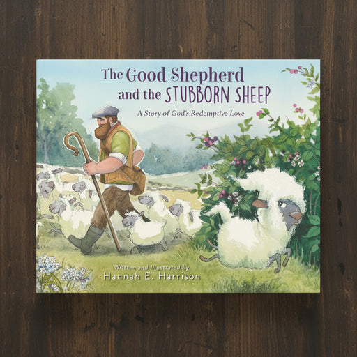 Book cover of 'The Good Shepherd and the Stubborn Sheep' on a wooden surface
