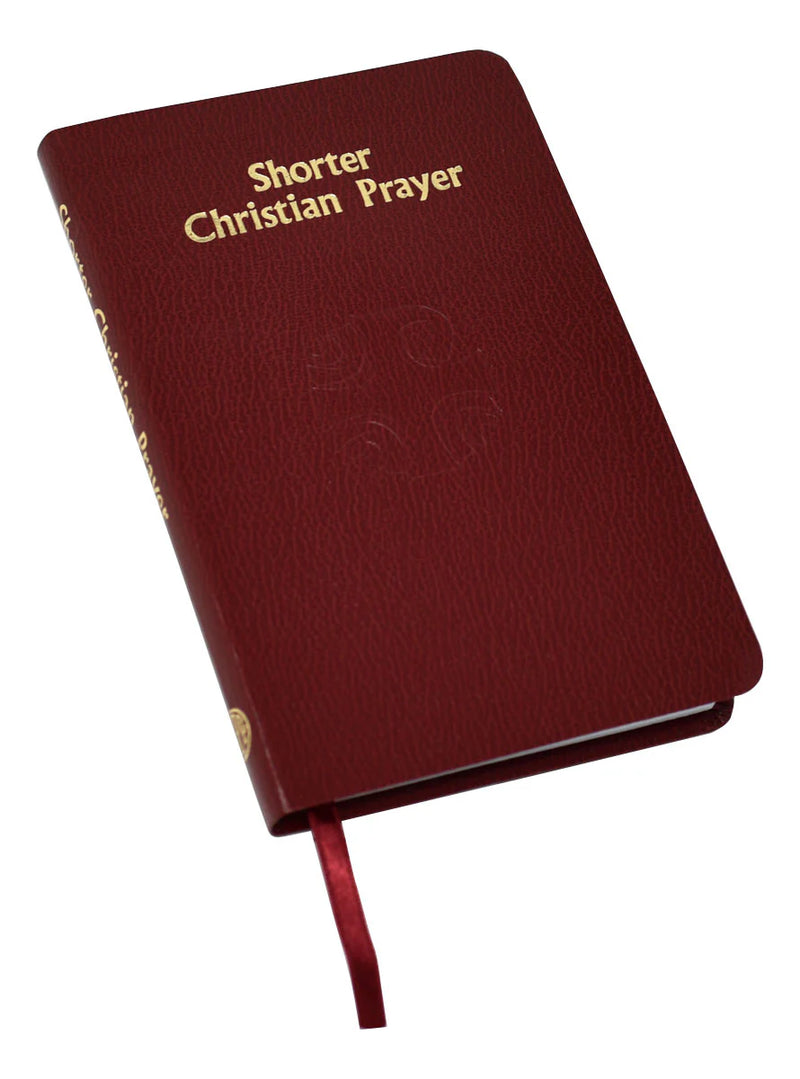 Red book titled 'Shorter Christian Prayer' on a white background