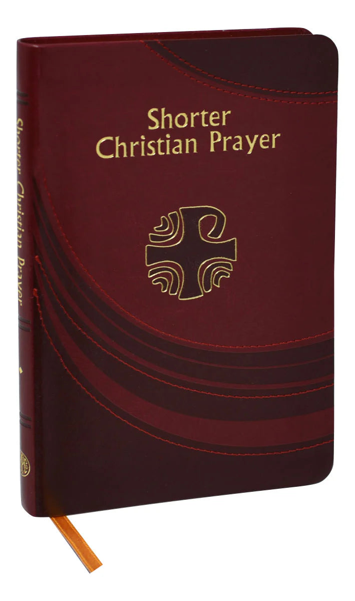 Maroon prayer book with gold text and cross symbol on a white background
