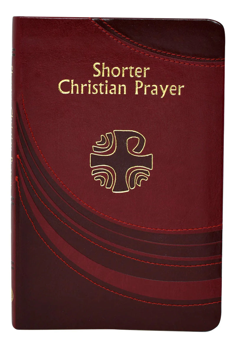 Maroon prayer book with gold text and cross symbol on a white background
