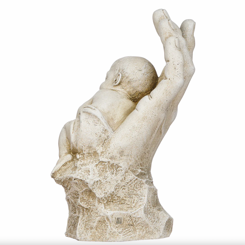 Serene statue of a hand holding a baby on a white background