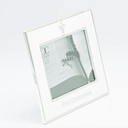 Side view of a white and silver First Communion picture frame for a 4x6 inch size photo on a white background.