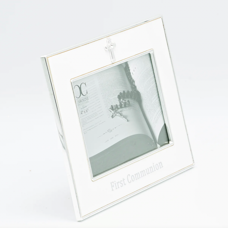 Side view of a white and silver First Communion picture frame for a 4x6 inch size photo on a white background.